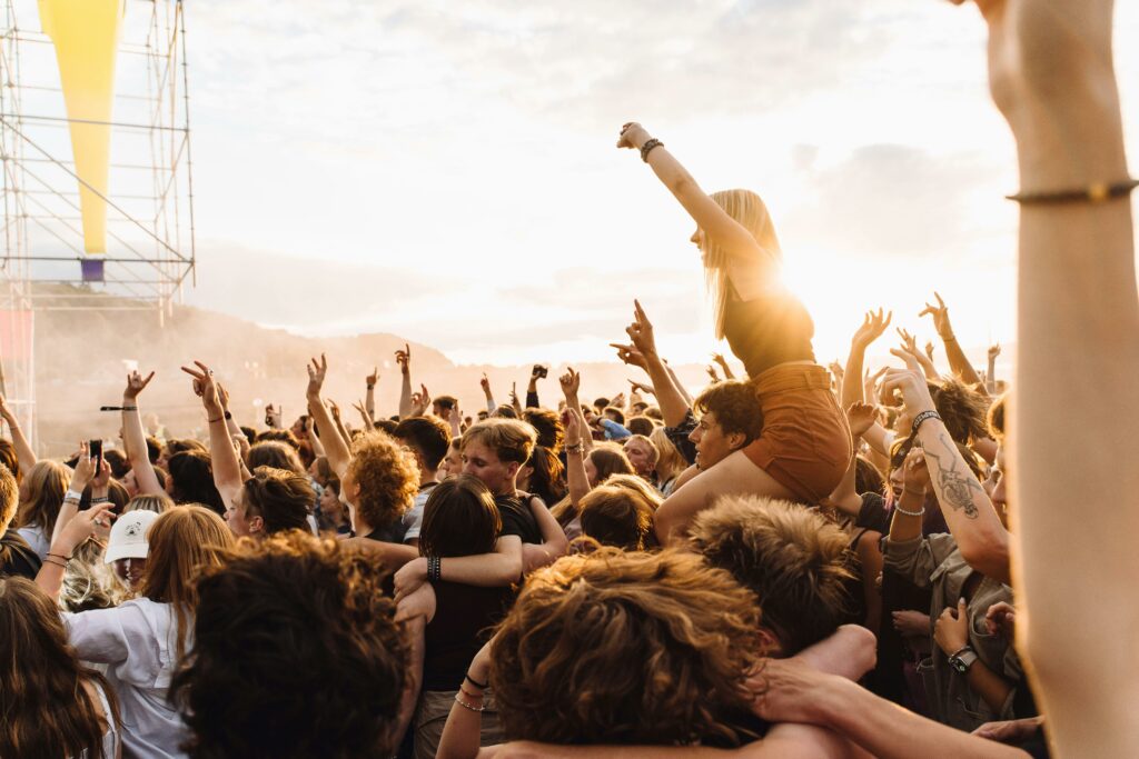 A crowd of people at a music festival